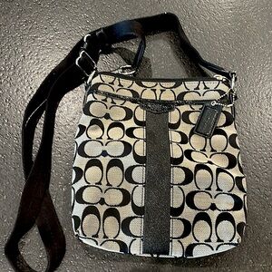Black classic print Coach crossbody bag